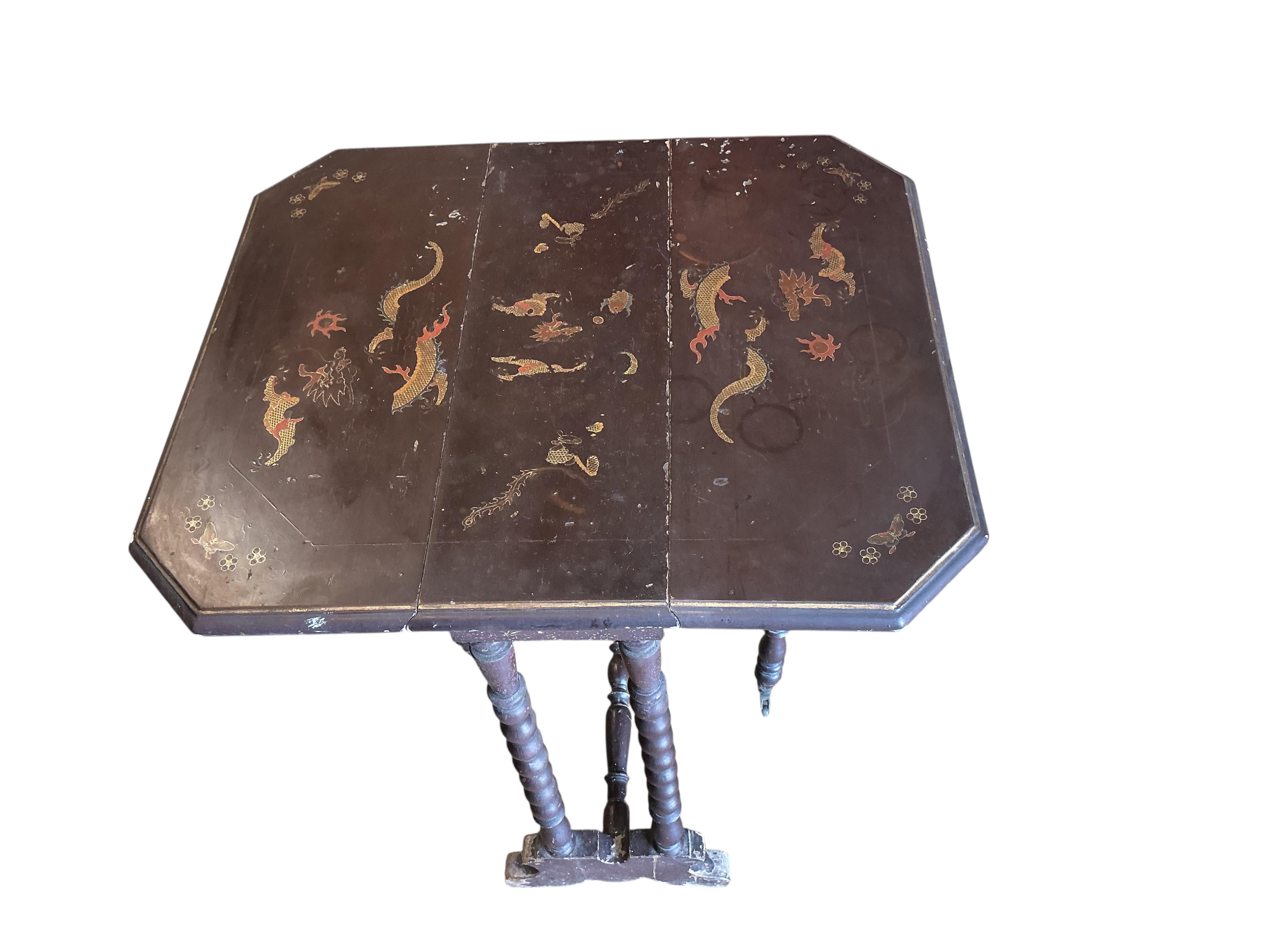 A chinoiserie lacquer bobbin turned Sutherland table, width 56cm, depth 21cm, height 69cm